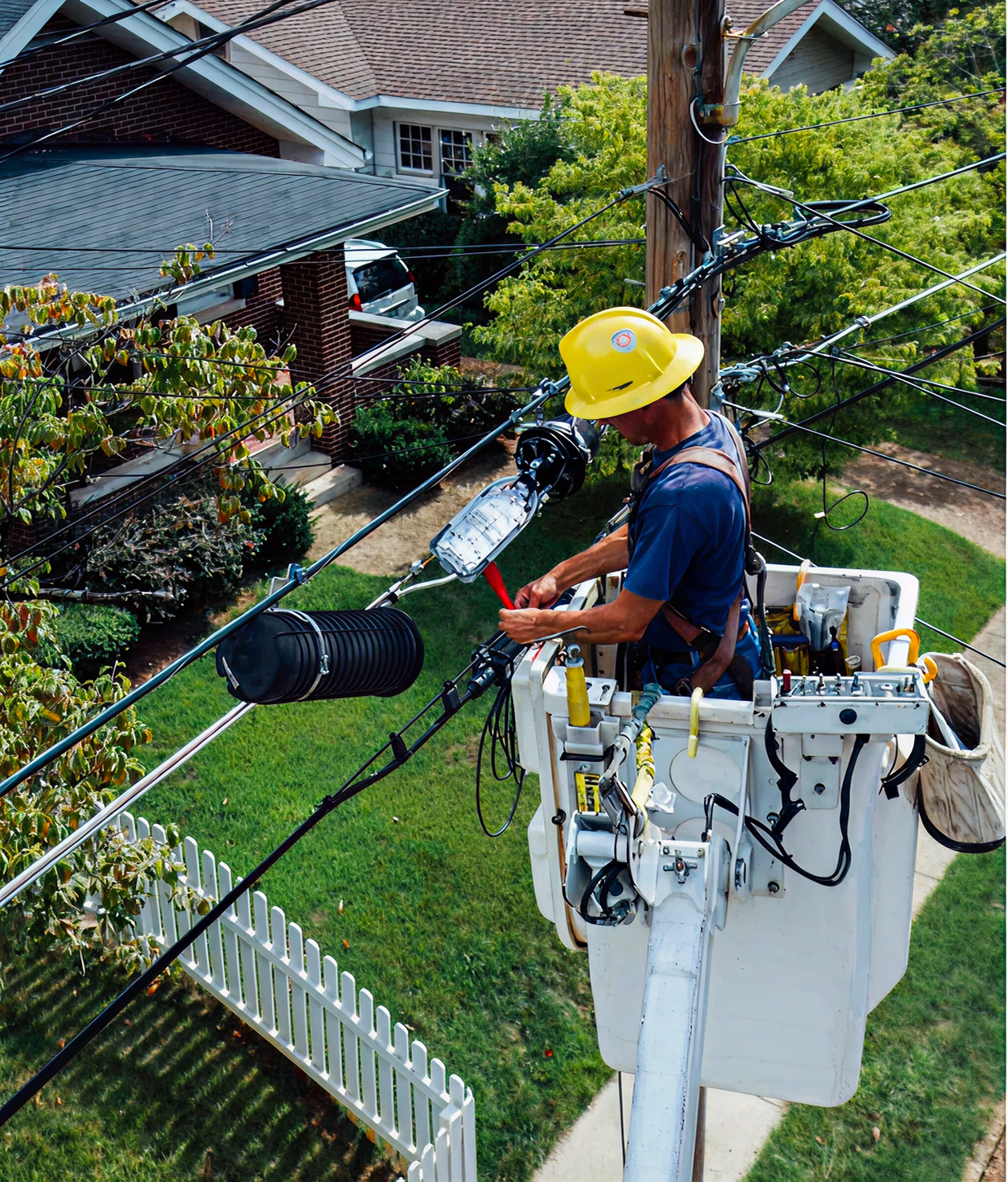 Electrician working on overhead power lines in Sydney